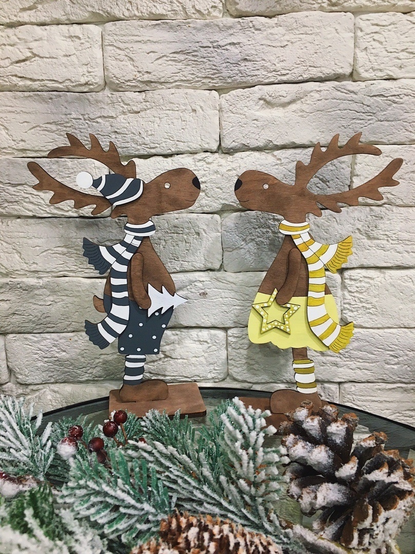 Laser Cut Christmas Deer Standing On A Stand Free Vector