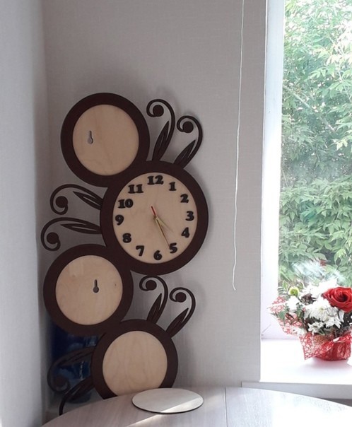Laser Cut Floral Decorative Wall Clock Free Vector